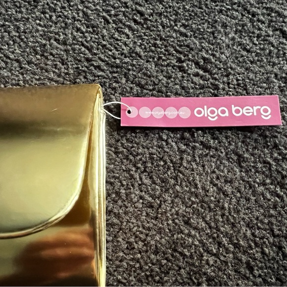 NWT - Olga berg gold clutch bag. NWT. Comes with chain strap. Rectangular clasp. - Picture 13 of 15
